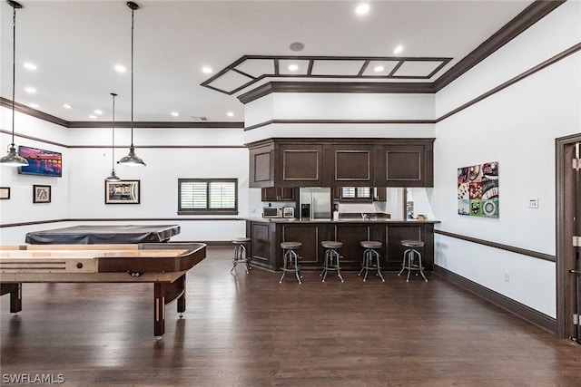 playroom with ornamental molding and dark hardwood / wood-style floors