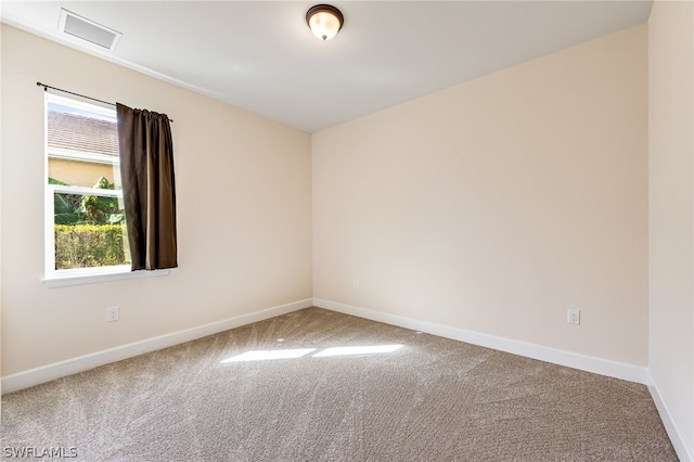 empty room featuring carpet flooring