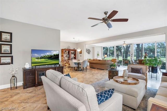 living room featuring ceiling fan