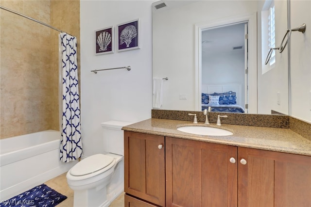 full bathroom featuring shower / tub combo, vanity, toilet, and tile patterned floors