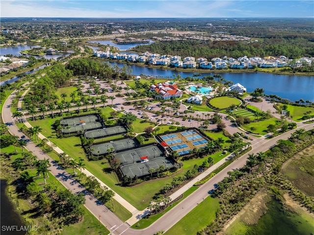 birds eye view of property with a water view