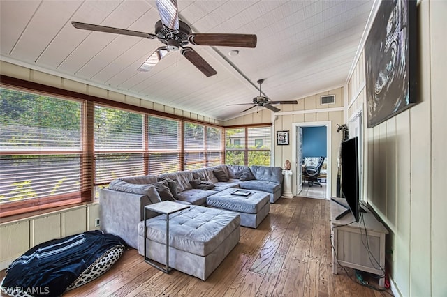 sunroom / solarium featuring ceiling fan and lofted ceiling