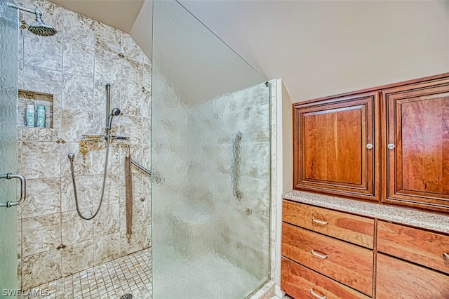 bathroom with an enclosed shower