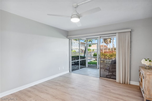 unfurnished room with light hardwood / wood-style floors and ceiling fan