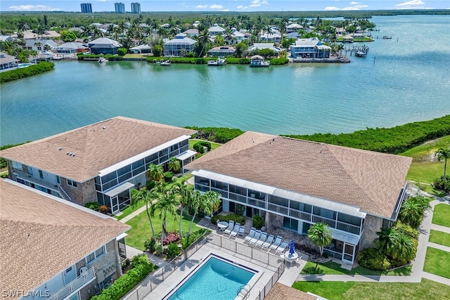 birds eye view of property featuring a water view