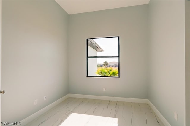 unfurnished room featuring wood-type flooring