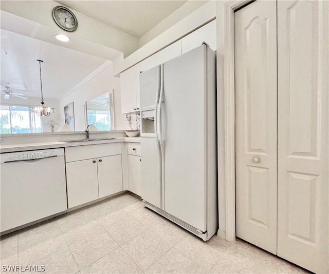 kitchen with ceiling fan, light tile floors, sink, white appliances, and ornamental molding