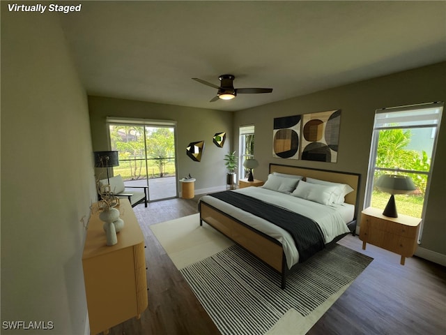 bedroom with access to outside, ceiling fan, and wood-type flooring