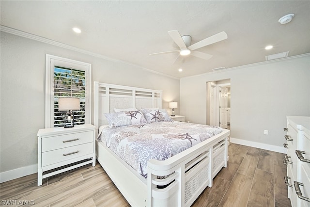 bedroom with ornamental molding, light hardwood / wood-style floors, ceiling fan, and ensuite bathroom