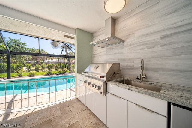 interior space featuring sink and light tile floors