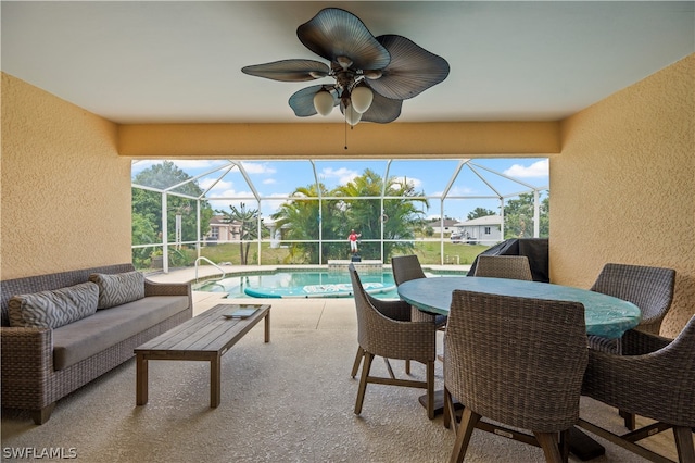 exterior space featuring a wealth of natural light and ceiling fan