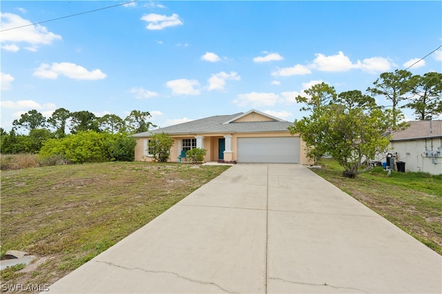 single story home with a front yard and a garage