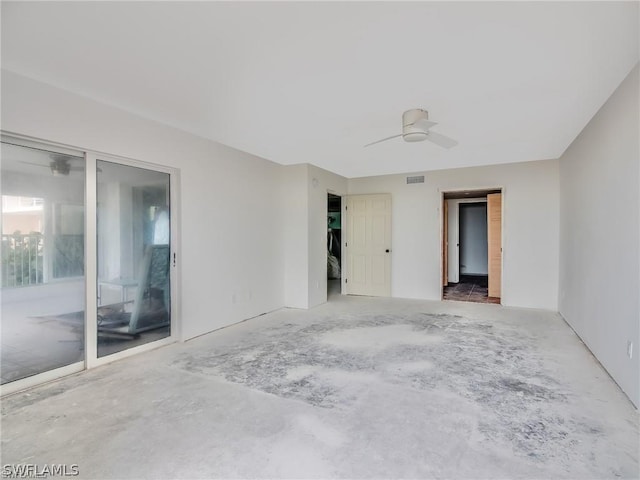 unfurnished room with ceiling fan