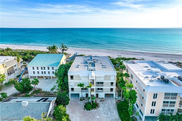 aerial view with a view of the beach and a water view