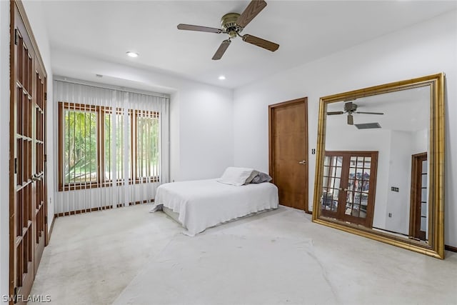 carpeted bedroom featuring ceiling fan and french doors