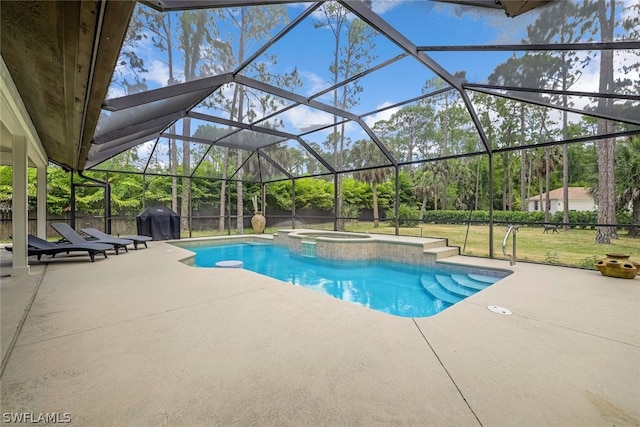 view of pool with a grill, a patio, a lawn, an in ground hot tub, and glass enclosure