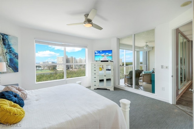 carpeted bedroom with ceiling fan and access to exterior