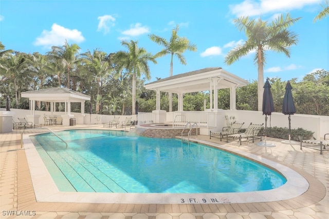 view of pool featuring a gazebo and a patio