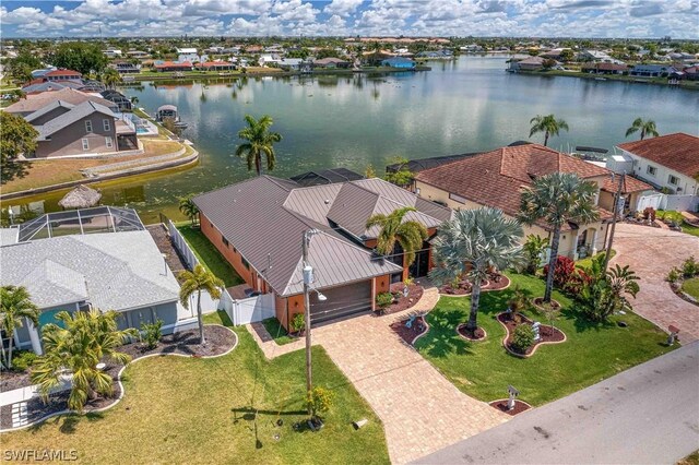 birds eye view of property featuring a water view