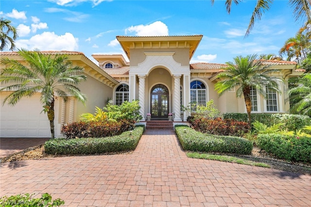 mediterranean / spanish home with french doors