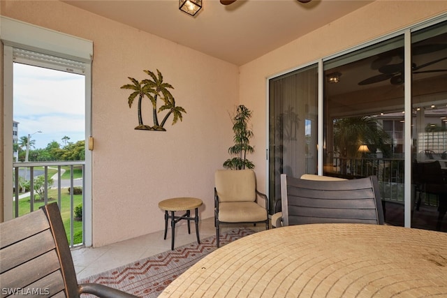 bedroom with access to exterior and tile flooring