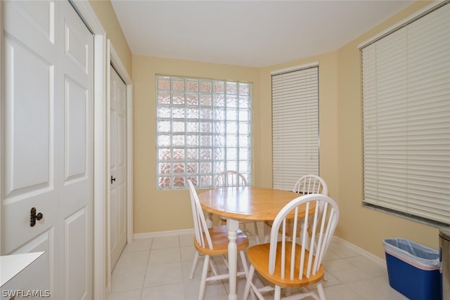 dining room featuring light tile flooring