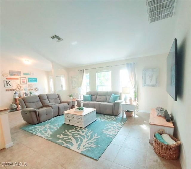 living room with light tile patterned flooring