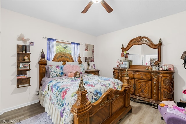 bedroom featuring ceiling fan and hardwood / wood-style flooring