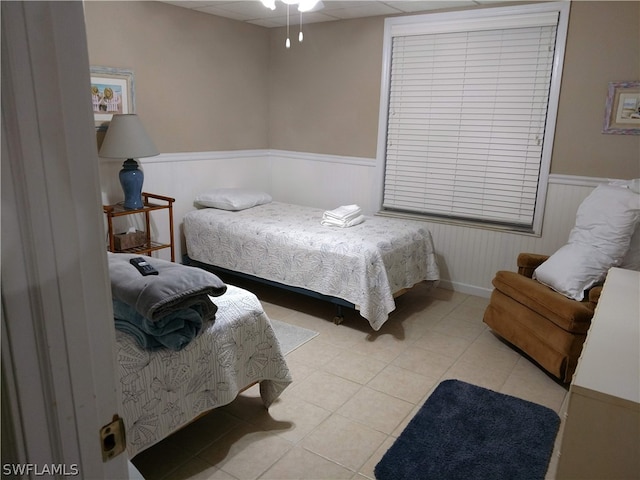 bedroom featuring tile floors