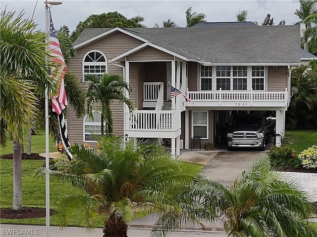 view of front facade with a carport