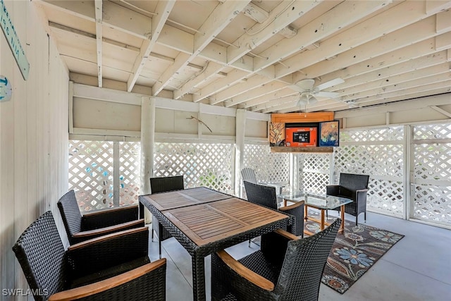 interior space featuring ceiling fan