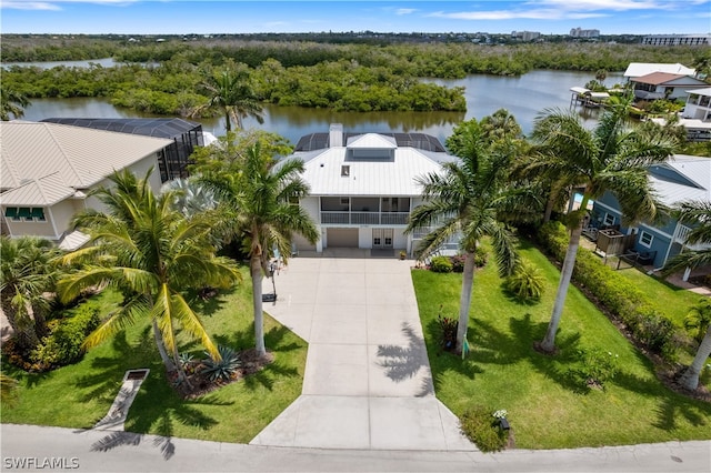 bird's eye view with a water view