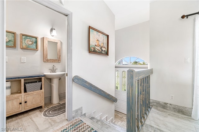 bathroom featuring sink and hardwood / wood-style floors