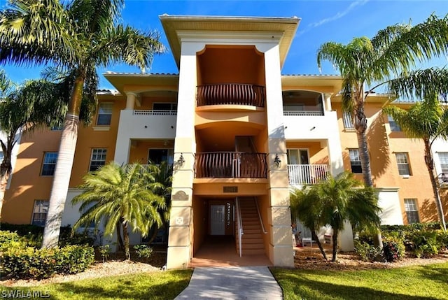 2904 Tuscan Dr Unit 302, Cape Coral, FL 33909 - view of property featuring stairway