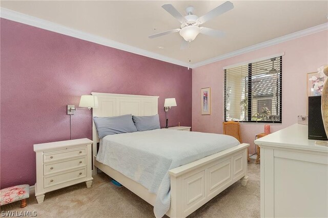 bedroom with light carpet, ceiling fan, and crown molding