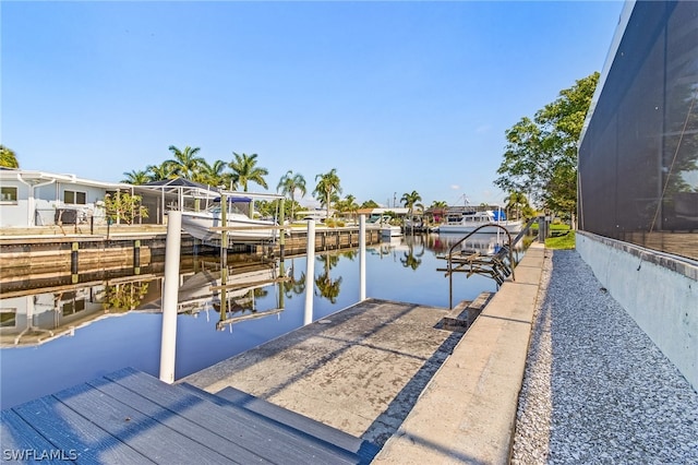 dock area featuring a water view