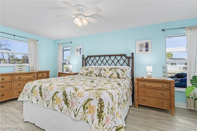 bedroom featuring ceiling fan and light wood-type flooring