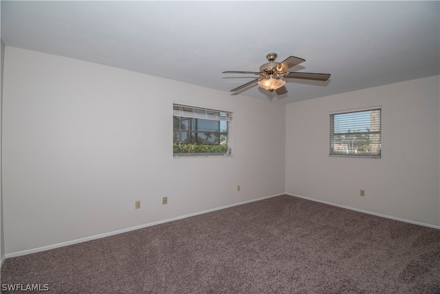 unfurnished room with carpet and ceiling fan