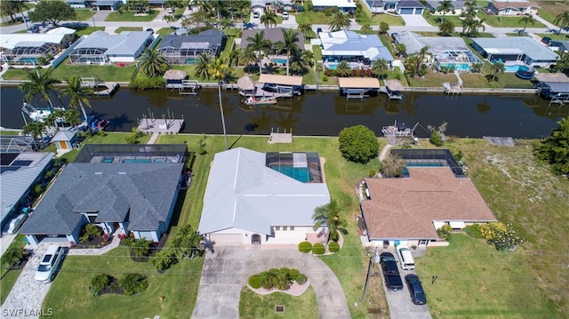 bird's eye view with a water view