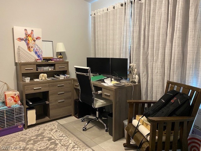 home office with light tile floors