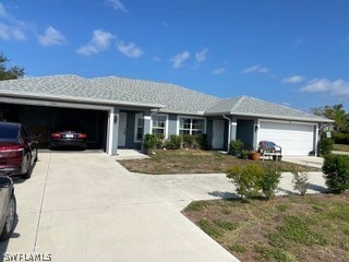 single story home featuring a garage