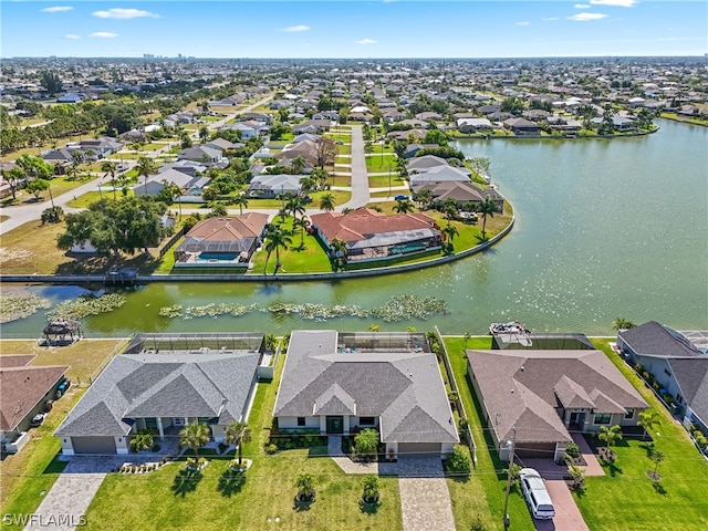 drone / aerial view with a water view