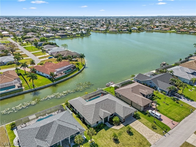 drone / aerial view with a water view