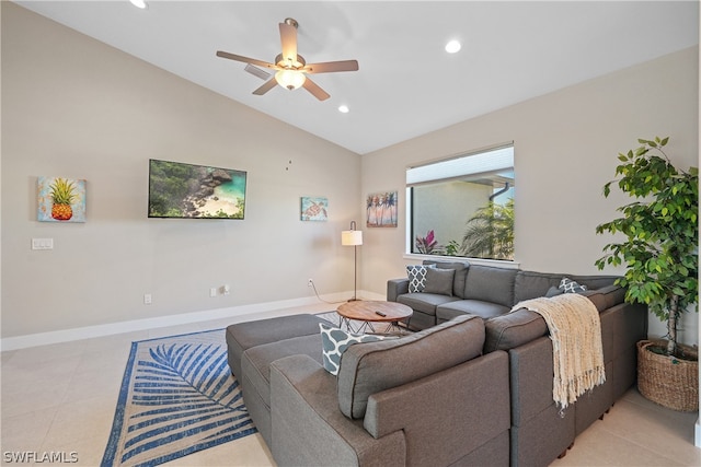 living room featuring lofted ceiling, ceiling fan, and light tile flooring