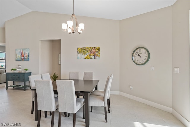 dining area featuring vaulted ceiling, a chandelier, and light tile floors