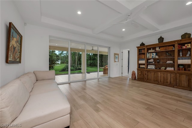 living room with beam ceiling, light hardwood / wood-style floors, and ceiling fan