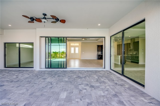 view of patio with ceiling fan