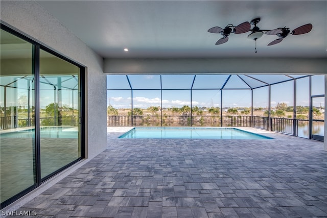 view of swimming pool with ceiling fan