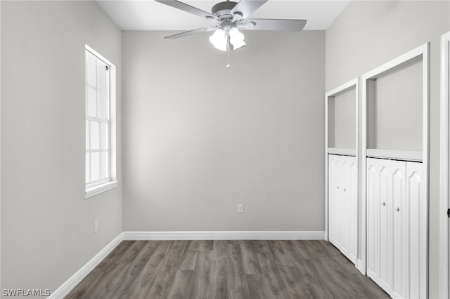 unfurnished bedroom with a closet, ceiling fan, and dark hardwood / wood-style floors