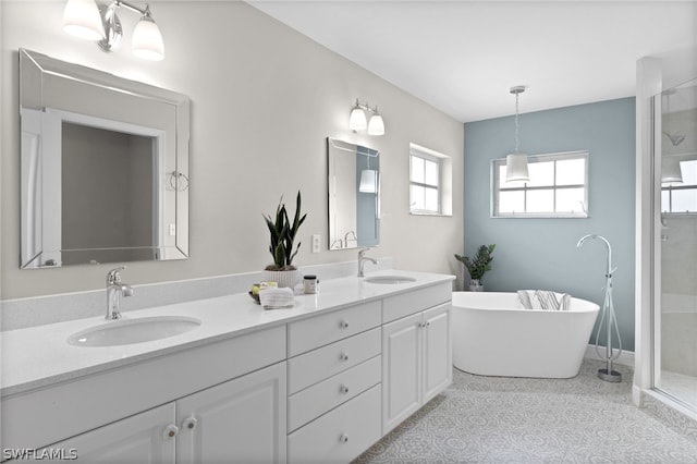 bathroom featuring tile flooring, independent shower and bath, and dual bowl vanity